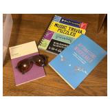 Puzzle books, sunglasses