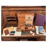 Briefcase, ledgers, desk accessories