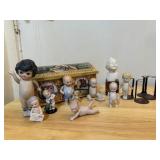 Tin or porcelain miniature dolls