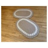 Beige oblong braided rugs (2)