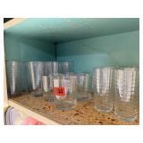 Shelf of drinking glasses