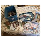 Tote of knitting needles, books, notions