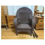 Wicker patio chair with rockers, cushion