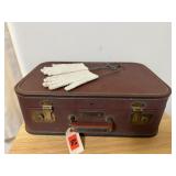 Suitcase, gloves, stretchers