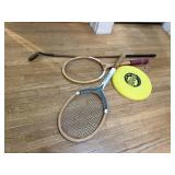 Tennis racquets, frisbee, golf club