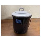 Enamel bot, oil cans, faucet handles, brass piece