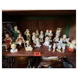 Shelf of vintage figurines