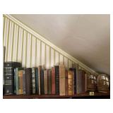 Shelf of books, book ends included