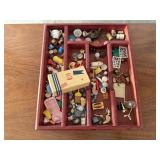 Tray of dollhouse miniatures