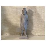 Stone fisherman statue