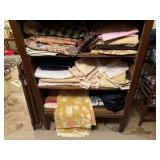 Contents of cupboard, fabric yardage