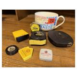 Mug of tape measures