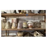 Shelf of light fixtures, shades