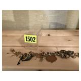 Antique gold "R" monogram ring, charm bracelet