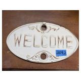 Cast iron welcome sign