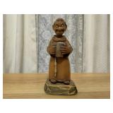 Drunken monk wood carving