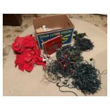 Strings of Christmas lights, banister bows, bulbs