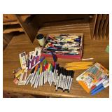 Markers, pens, pencils, pen holder