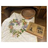 Embroidered linen, basket, Lincoln Highway book,