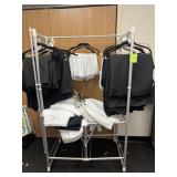 Rack with assorted table linens -  various sizes