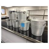 9 - steel ice buckets with built in bottle opener