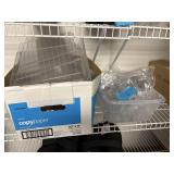 Box and tote filled with business card holders