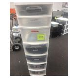 Tall plastic drawers full of event linens
