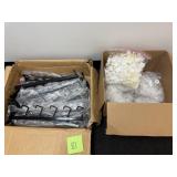 Boxes of shelving hooks and small hooks