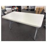 Heavy duty table, with folding legs and cover.