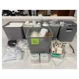 Baskets of cutlery, portion cups, calculator, etc.