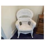 White wicker rocking chair