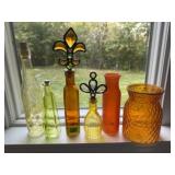 Orange, yellow bottles, vases