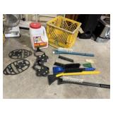 Crate of ice melt, windshield scrapers, ice tracks