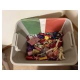 Tote of tissue paper, holiday bows, ribbons