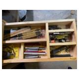 Metal files, folding tape measures, staples