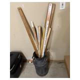 Milk can, yard sticks