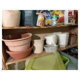 Shelf of plastic flower pots