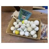 Golf balls, tees, golf books