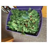 Tote of holiday greenery, garland