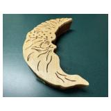Main in the moon wood carving
