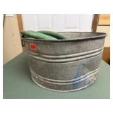 Galvanized wash tub, garden hose
