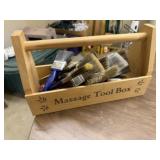 Wooden toolbox of paint brushes