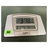 Sharp battery operated atomic clock