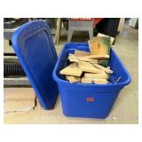 Storage tote of wood scraps, blocks