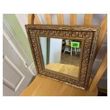 Gold wall mirror