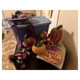 Tote of Halloween decorations, pumpkins,