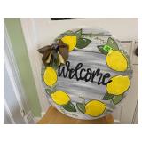 Welcome round wood sign