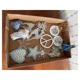 Box of Christmas ornaments, reindeer, peace sign