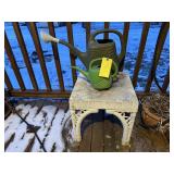 Plastic patio table, watering cans (2)