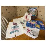 Basket of flamingo towels, shot glass, ornament,
